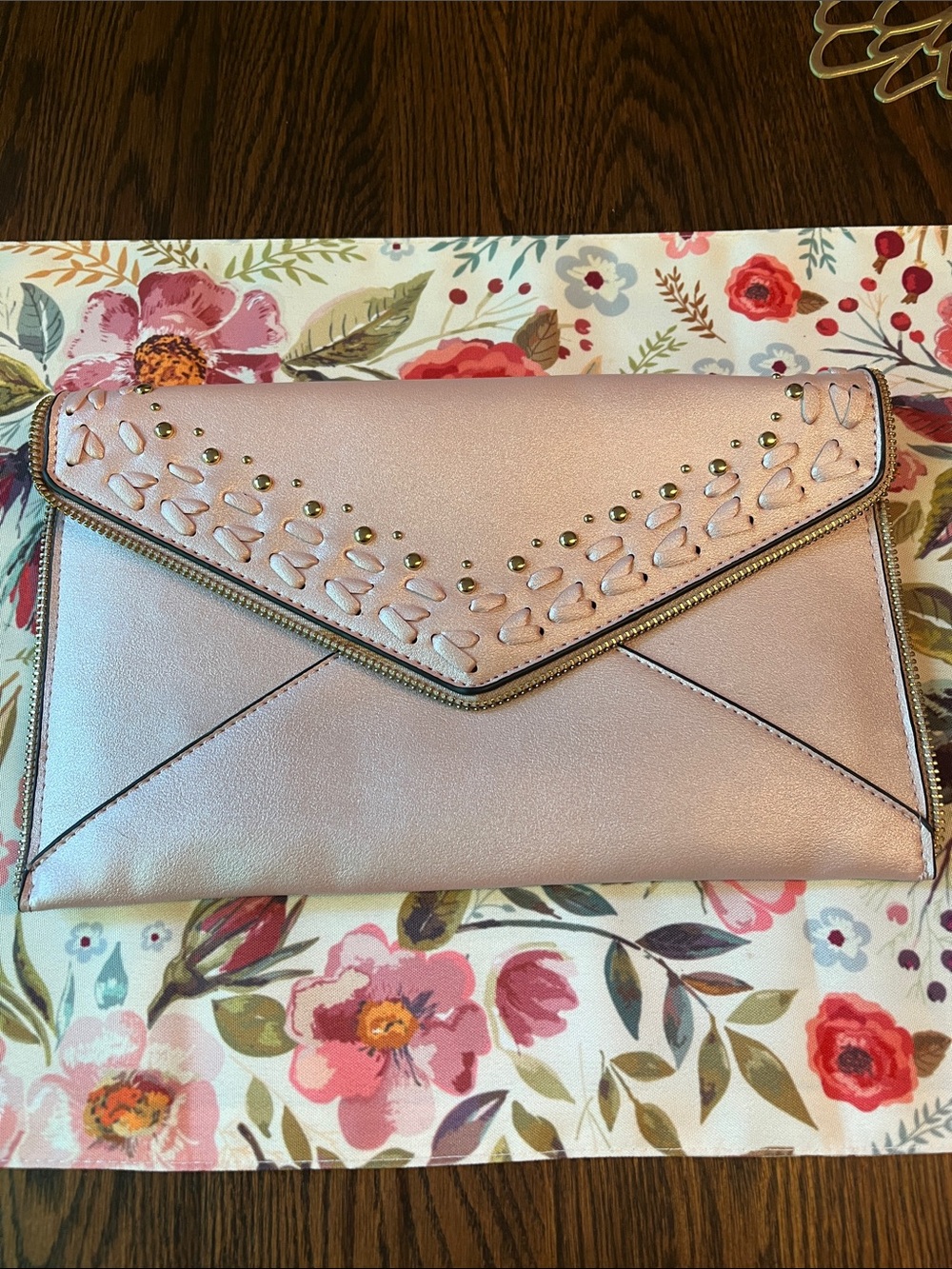 Light pink Metallic Envelope Clutch with gold  Accents and gold shoulder chain.